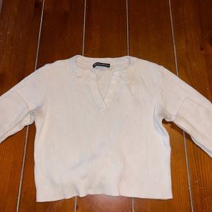 brandy top size small with 3 buttons on top. super comfy